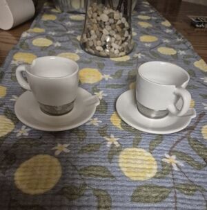 A Pair Of Starbucks Cup And Saucer